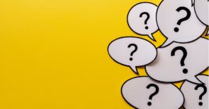 Collage of question marks in speech bubbles against a yellow background.
