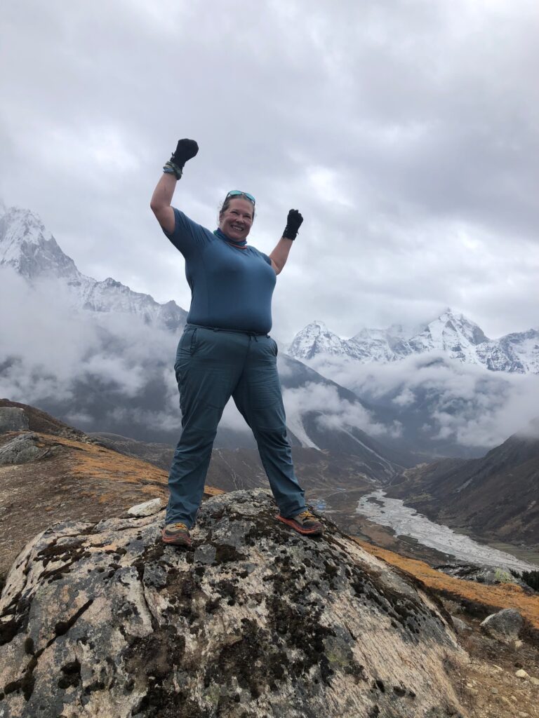 Jenn at the summit of Mount Everest